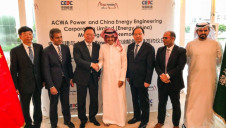 (Third from left) Energy China chairman Wang Jianping shakes hands with ACWA Power chairman Mohammad Abunayyan; supported by (second from left) ACWA Power chief executive Paddy Padmanathan